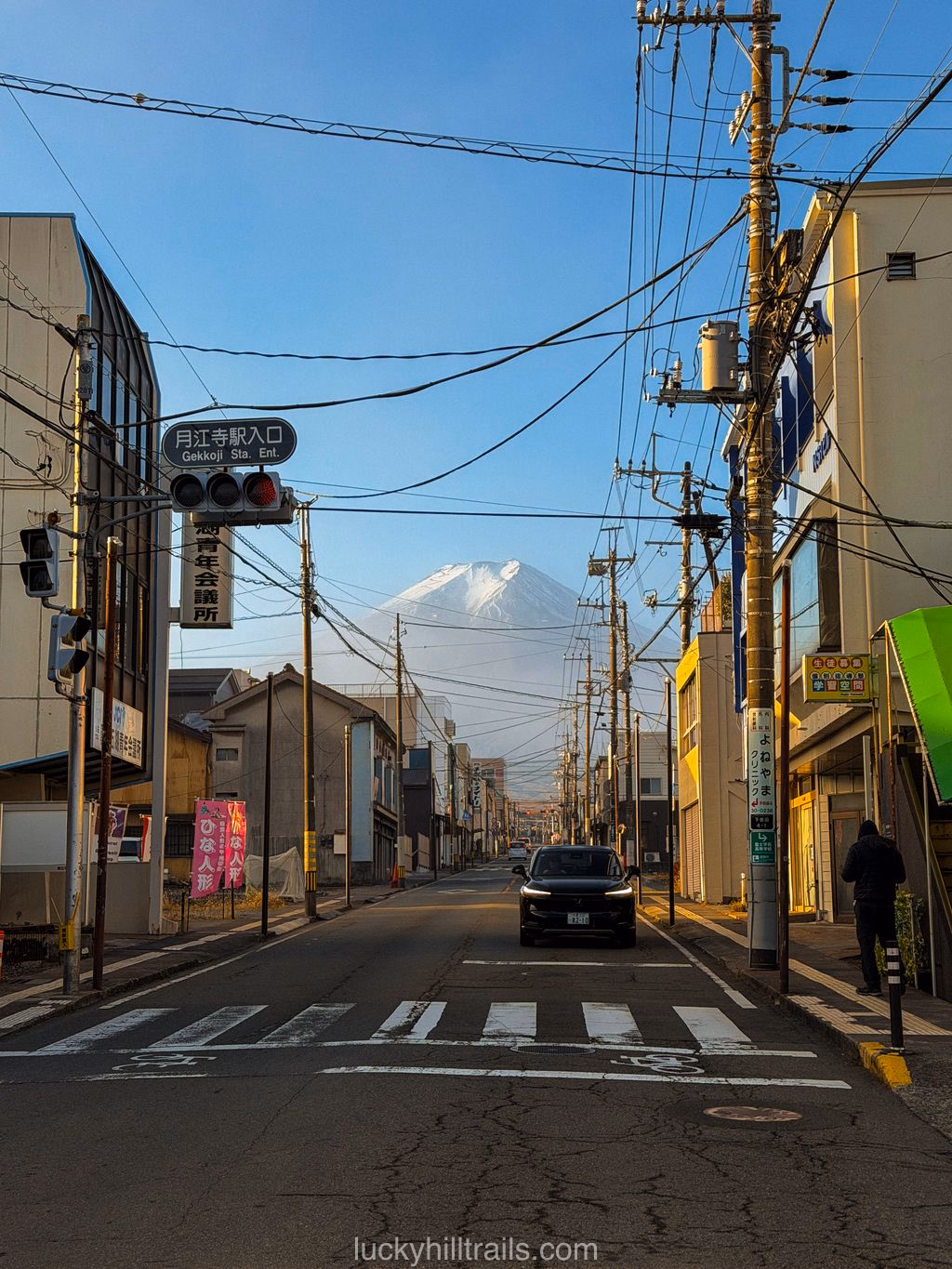 Mount Fuji visible from the road amid the Japanese landscape