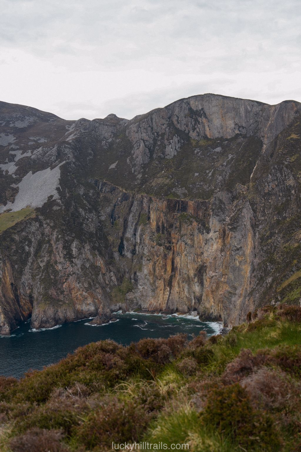 The massive vertical cliffs of Slieve League, over 600 metres high, above the dark Atlantic Ocean, Donegal, Ireland
