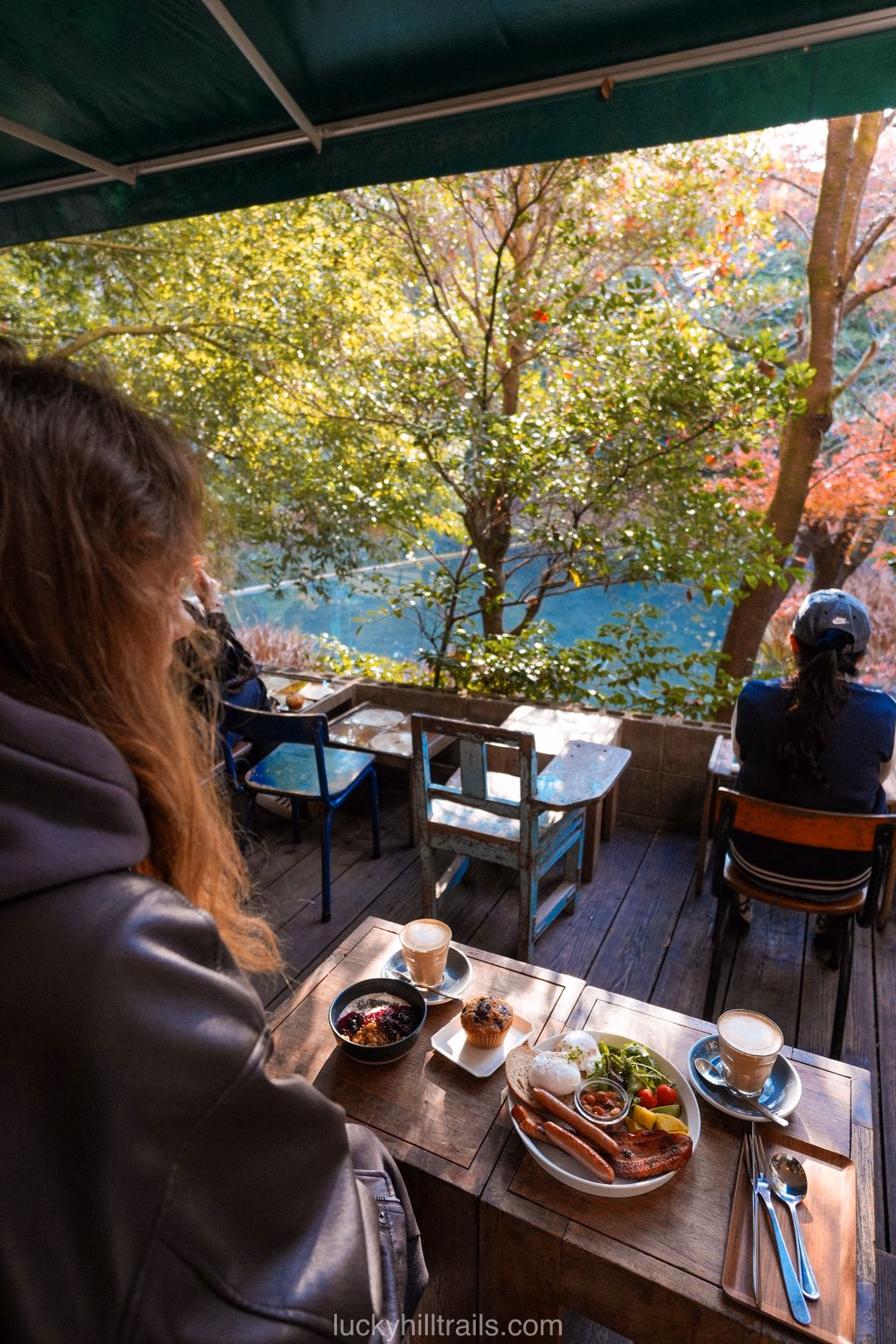 Breakfast on the open terrace of Vermillion Cafe near Fushimi Inari among autumn foliage, Kyoto