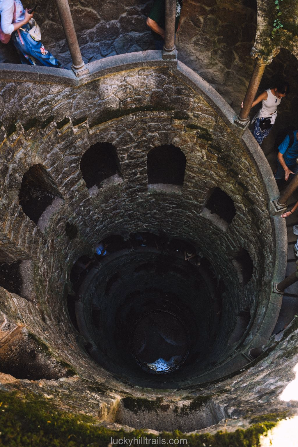 Initiation Well (Poço Iniciático) at Quinta da Regaleira – view from above of the spiral stone stairs descending into the earth, Sintra, Portugal