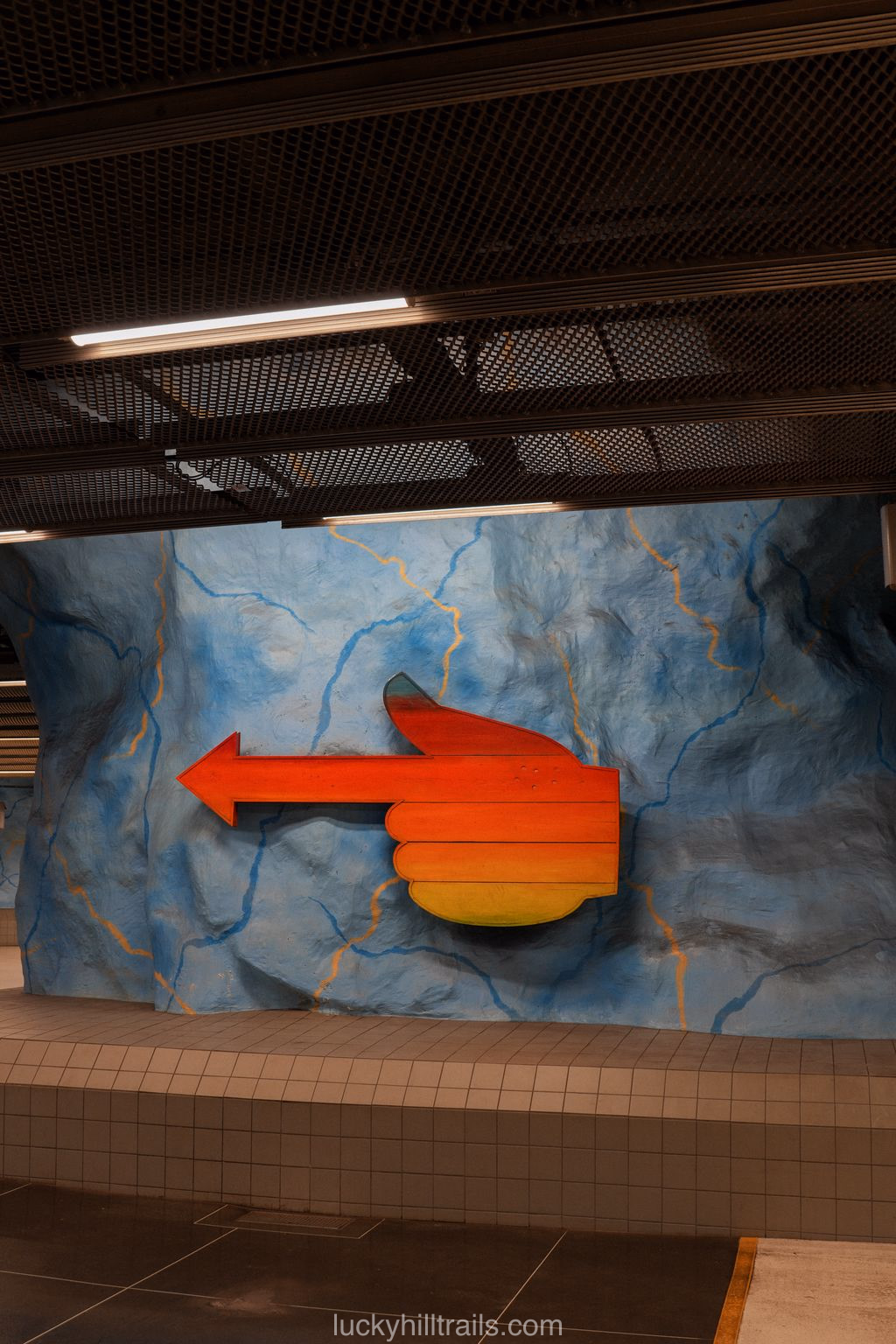 Colorful rainbow arches in the design of Stadion station in the Stockholm metro